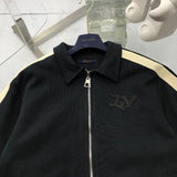 Front view of Louis Vuitton luxury clothing with tailored silhouette