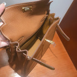 Side view of streamlined structured handbag
