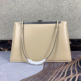 Front view of sleek modern women's handbag – women's luxury accessory