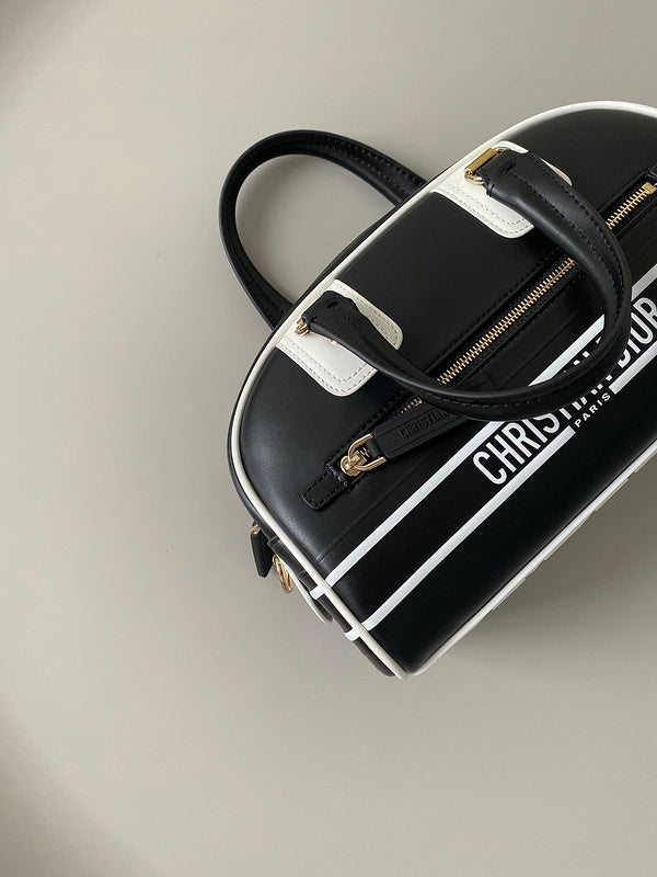 Styled lifestyle shot of signature everyday-luxe women's handbag – women's designer-style accessory
