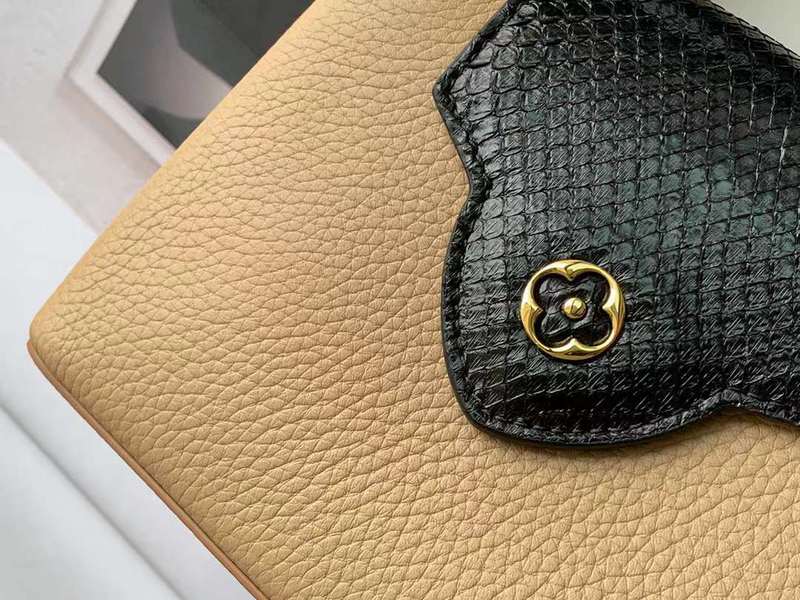 Top view of signature modern women's handbag – women's luxury handbag