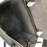 Side profile of everyday-luxe signature women's handbag – women's luxury accessory