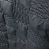 Front view of Louis Vuitton luxury clothing with label-forward styling
