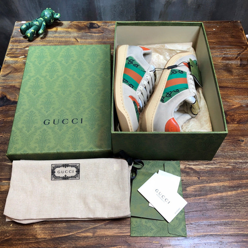 Side profile of Gucci stone beige sneakers bold athletic profile