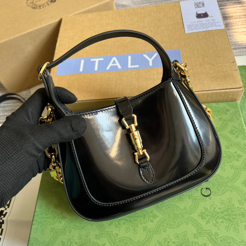 Handle and strap detail of polished sleek women's handbag – women's luxury accessory