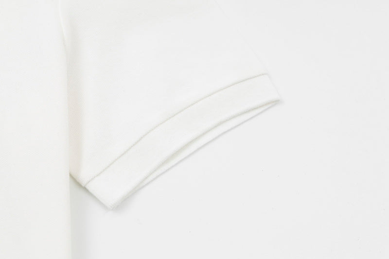 Flat lay presentation of Polo cotton polo shirt with logo-detail design