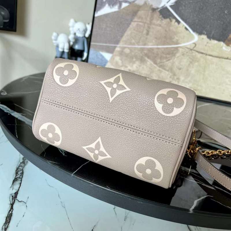 Styled lifestyle shot of signature polished women's handbag – women's everyday handbag