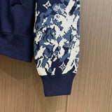 Back view of Louis Vuitton luxury clothing with monogram-inspired silhouette