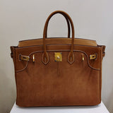 Side view of curated structured handbag