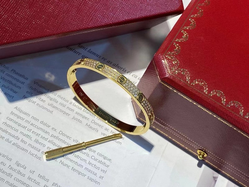 Side view of Cartier unisex jewelry piece