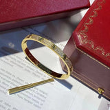 Side view of Cartier unisex jewelry piece