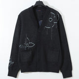 Close-up detail shot of Louis Vuitton luxury clothing with relaxed-fit cut