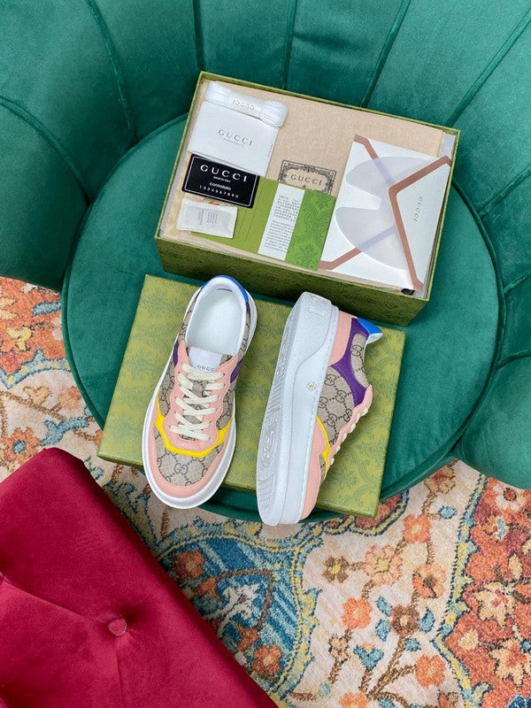 Gucci crisp white luxury sneakers view 4 retro runner design