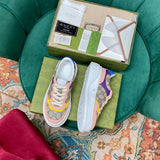 Gucci crisp white luxury sneakers view 4 retro runner design