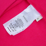 Close-up detail shot of Gucci luxury clothing with everyday silhouette