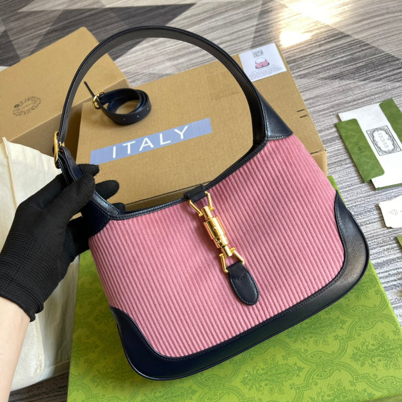 Handle and strap detail of refined classic women's handbag – women's luxury handbag