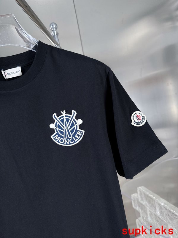 Close-up detail shot of Moncler luxury clothing with everyday silhouette