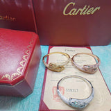 Side view of Cartier unisex jewelry piece
