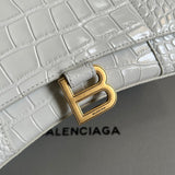 Styled lifestyle shot of classic structured women's handbag – women's designer-style accessory