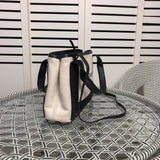 Back view of structured everyday-luxe women's handbag – women's everyday handbag