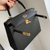 Sculpted handbag styled for everyday wear