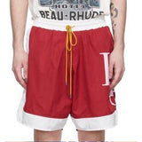 Close-up detail shot of Rhude luxury clothing with label-forward styling
