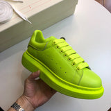 Alexander McQueen two-tone luxury sneakers view 7 signature lace-up style