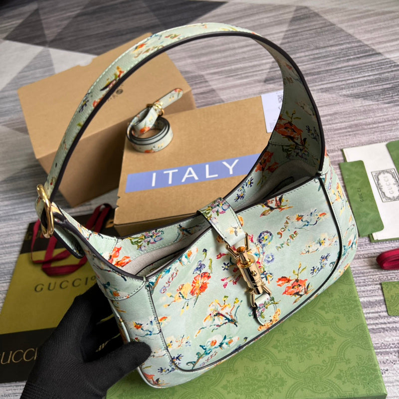 Side profile of everyday-luxe structured women's handbag – women's luxury accessory