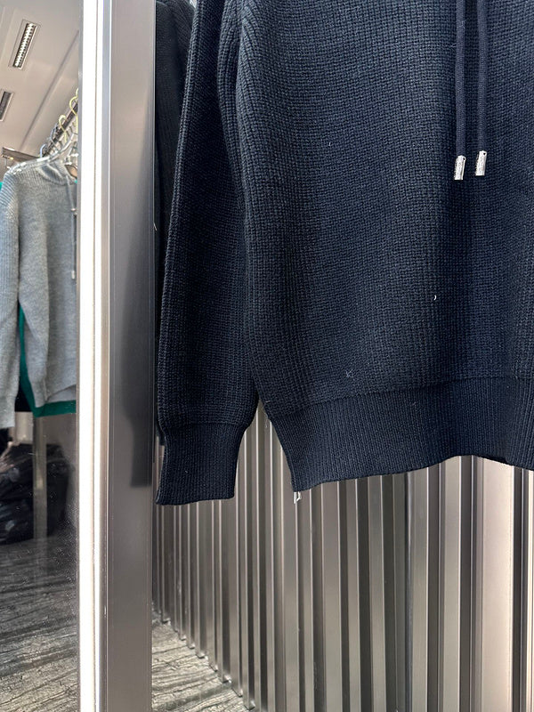 Flat lay presentation of Louis Vuitton luxury clothing with everyday silhouette