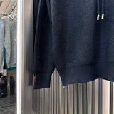 Flat lay presentation of Louis Vuitton luxury clothing with everyday silhouette
