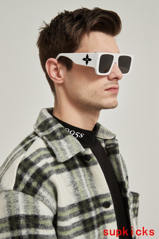 Close-up detail view of Louis Vuitton unisex sunglasses