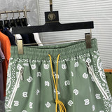 Close-up detail shot of Rhude luxury clothing with runway-inspired design