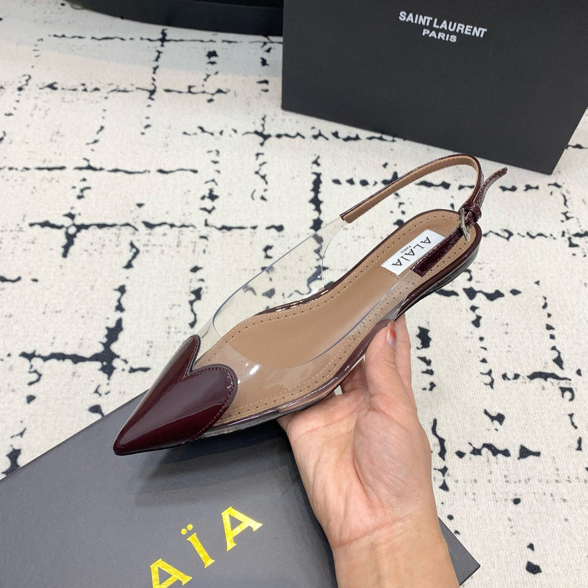 Front view of Alaïa Flats premium footwear