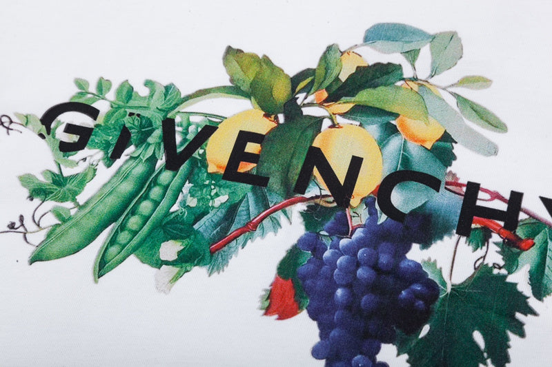 Flat lay presentation of Givenchy luxury clothing with signature branding