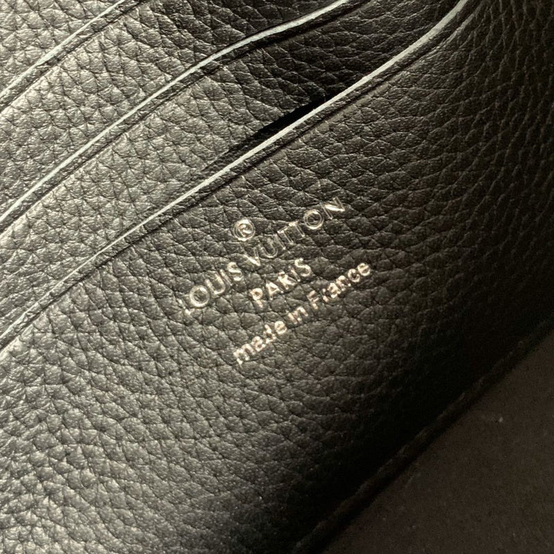 Side profile of premium refined women's handbag – women's statement bag