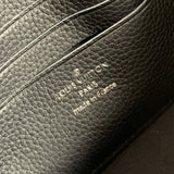 Side profile of premium refined women's handbag – women's statement bag