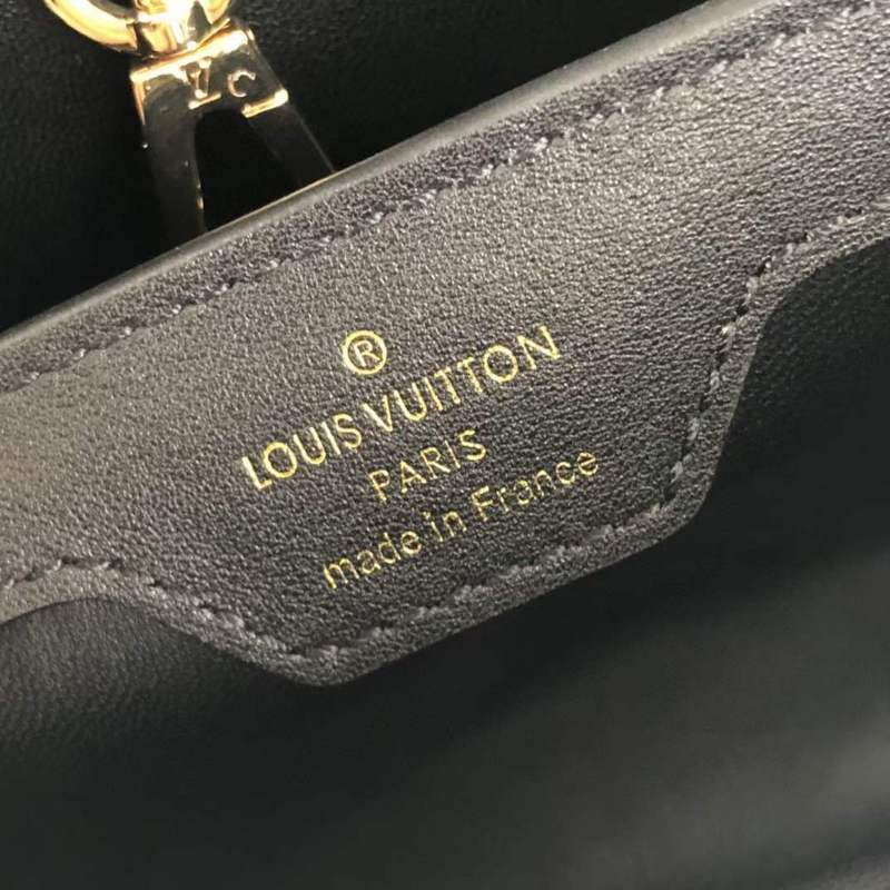 Side profile of classic everyday-luxe women's handbag – women's statement bag