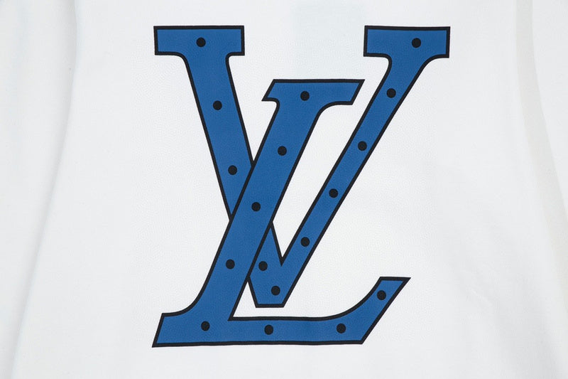 Close-up detail shot of Louis Vuitton luxury clothing with signature branding
