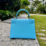 Side view of streamlined structured handbag