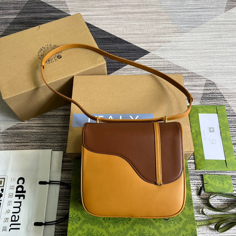 Styled lifestyle shot of signature classic women's handbag – women's luxury accessory