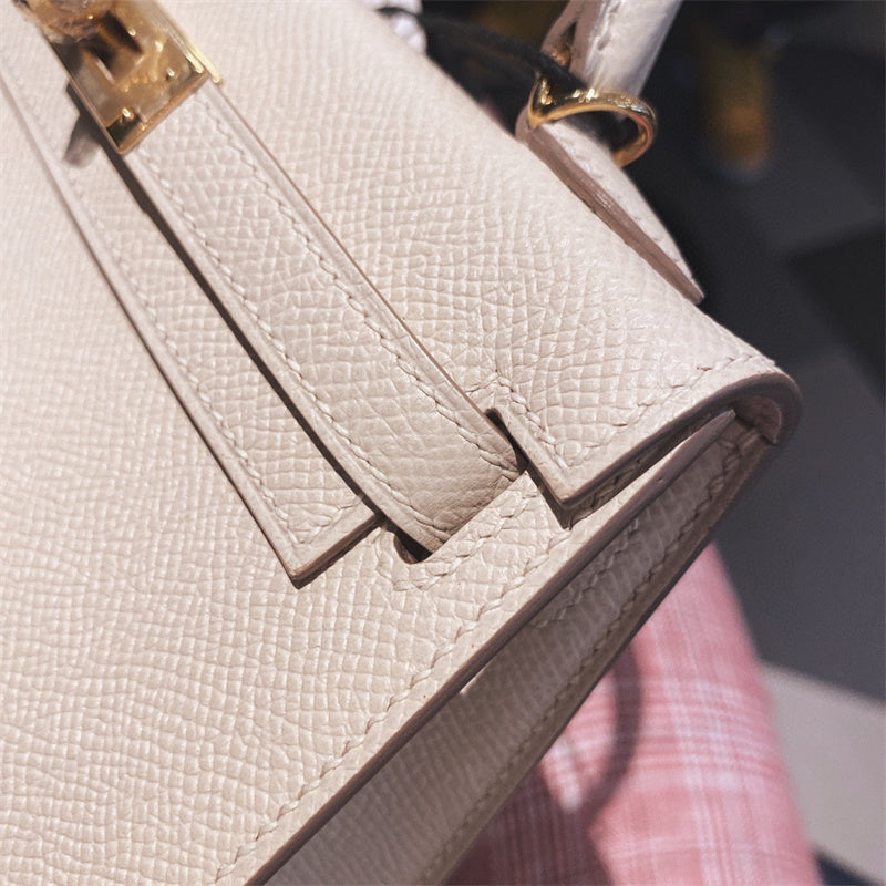 Side view of tailored structured handbag