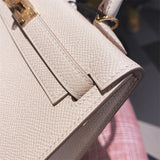 Side view of tailored structured handbag