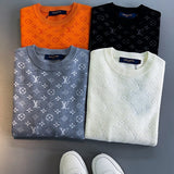 Close-up detail shot of Louis Vuitton luxury clothing with monogram-inspired silhouette