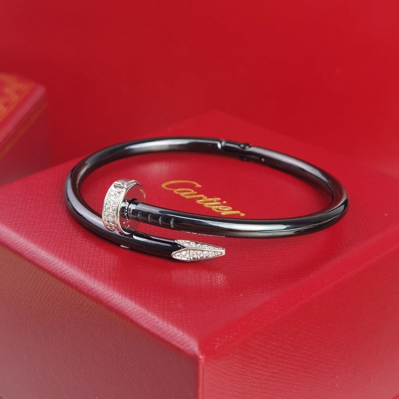 Close-up detail view of Cartier unisex jewelry piece