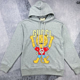 Back view of Gucci luxury clothing with monogram-inspired silhouette