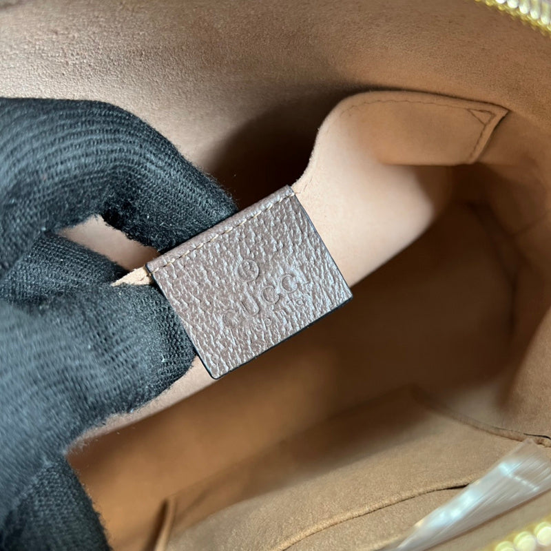 Side profile of signature modern women's handbag – women's everyday handbag