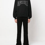 Side profile view of Amiri luxury piece style No.095
