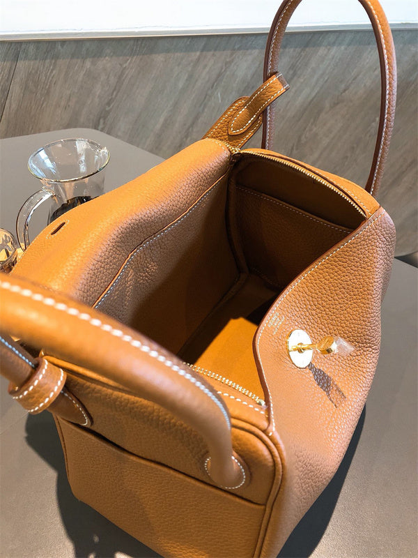 Side view of sleek structured handbag