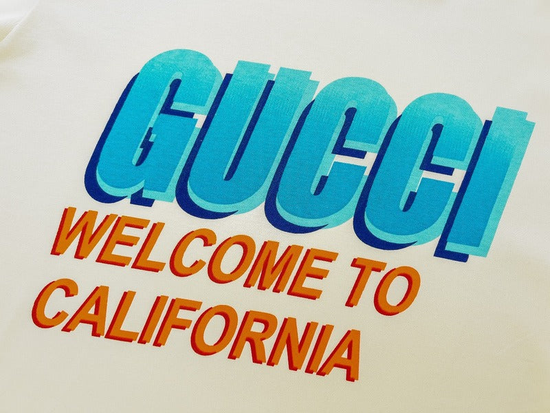 Flat lay presentation of Gucci luxury clothing with runway-inspired design