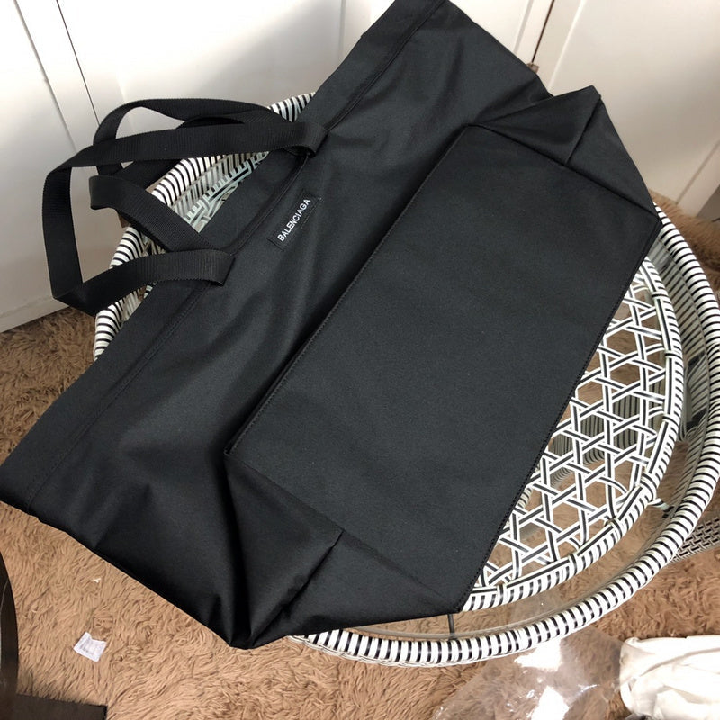 Styled lifestyle shot of elevated sleek women's handbag – women's luxury handbag